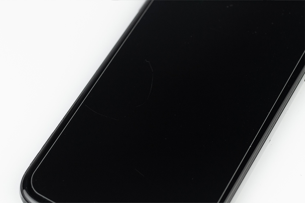 Exempel på iPhone i Grade C, bild 3 av 9, som visar produktens kosmetiska skick